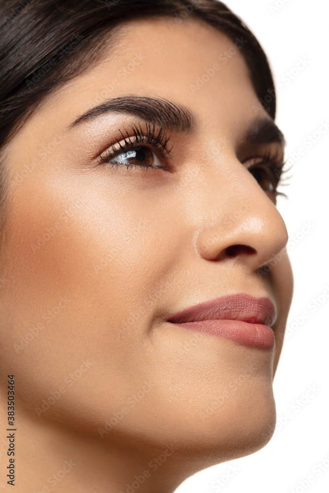 Close-up. Portrait of beautiful jewish woman isolated on white studio background. Beauty, fashion, skincare, cosmetics, ad concept. Copyspace. Well-kept skin and natural fresh look. Healthy and shiny. Close-up. Portrait of beautiful jewish woman isolated on white studio background. Beauty, fashion, skincare, cosmetics, ad concept. Copyspace. Well-kept skin and natural fresh look. Healthy and shiny.