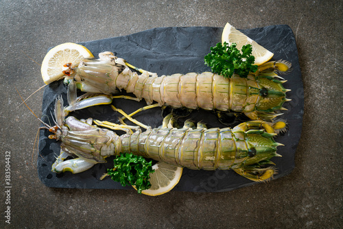 fresh mantis shrimp with lemon photo