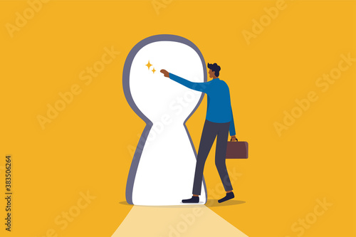 Secret of success, bright future of business opportunity, new challenge or freedom concept, curiosity businessman reach out to the bright shining key hold and start walking to achieve business goal.