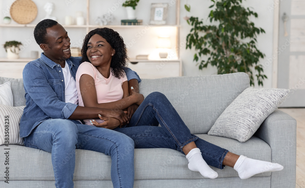 Beautiful african american lovers bonding at home Beautiful african american lovers bonding at home