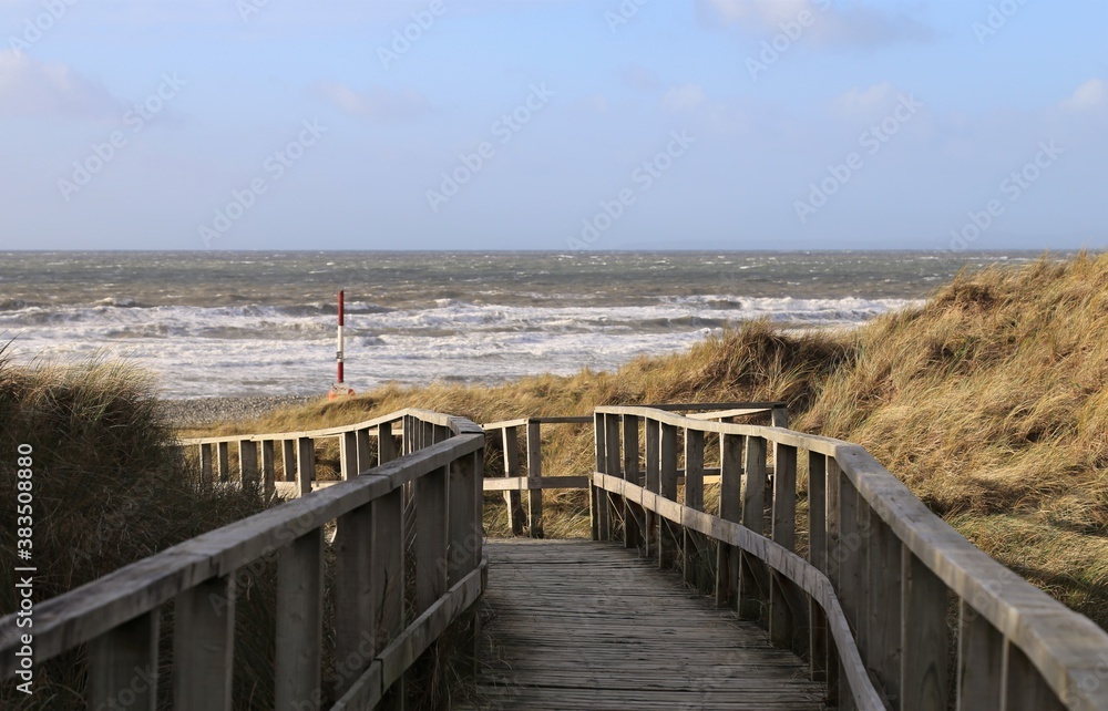Approaching the stormy, wintry beach at Dyffryn Ardudwy, Wales, UK. Approaching the stormy, wintry beach at Dyffryn Ardudwy, Wales, UK.