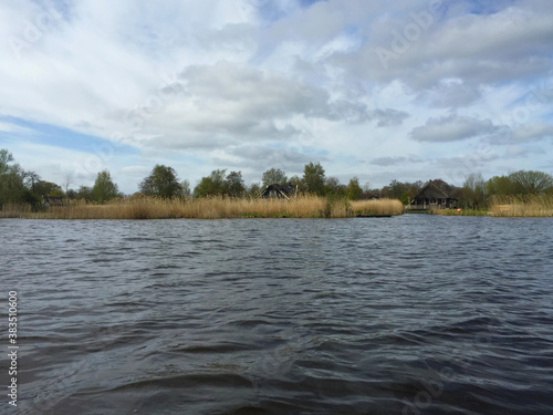 landscape with river and sky in the village of Giethoorn  Holland Netherlands