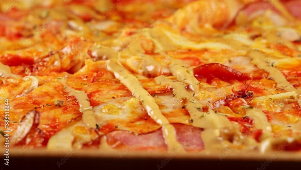 Freshly prepared pizza in a cardboard box. Freshly prepared pizza in a cardboard box.