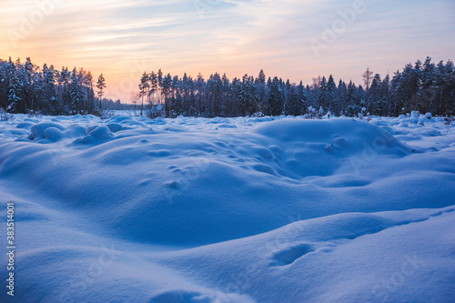 Snowdrifts on a winter evening. Russia