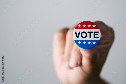 man with a vote badge for the US election