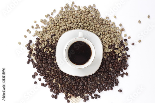 Black coffee is served in a glass cup, which is placed on a bamboo plate and sprinkled with neatly arranged coffee beans.