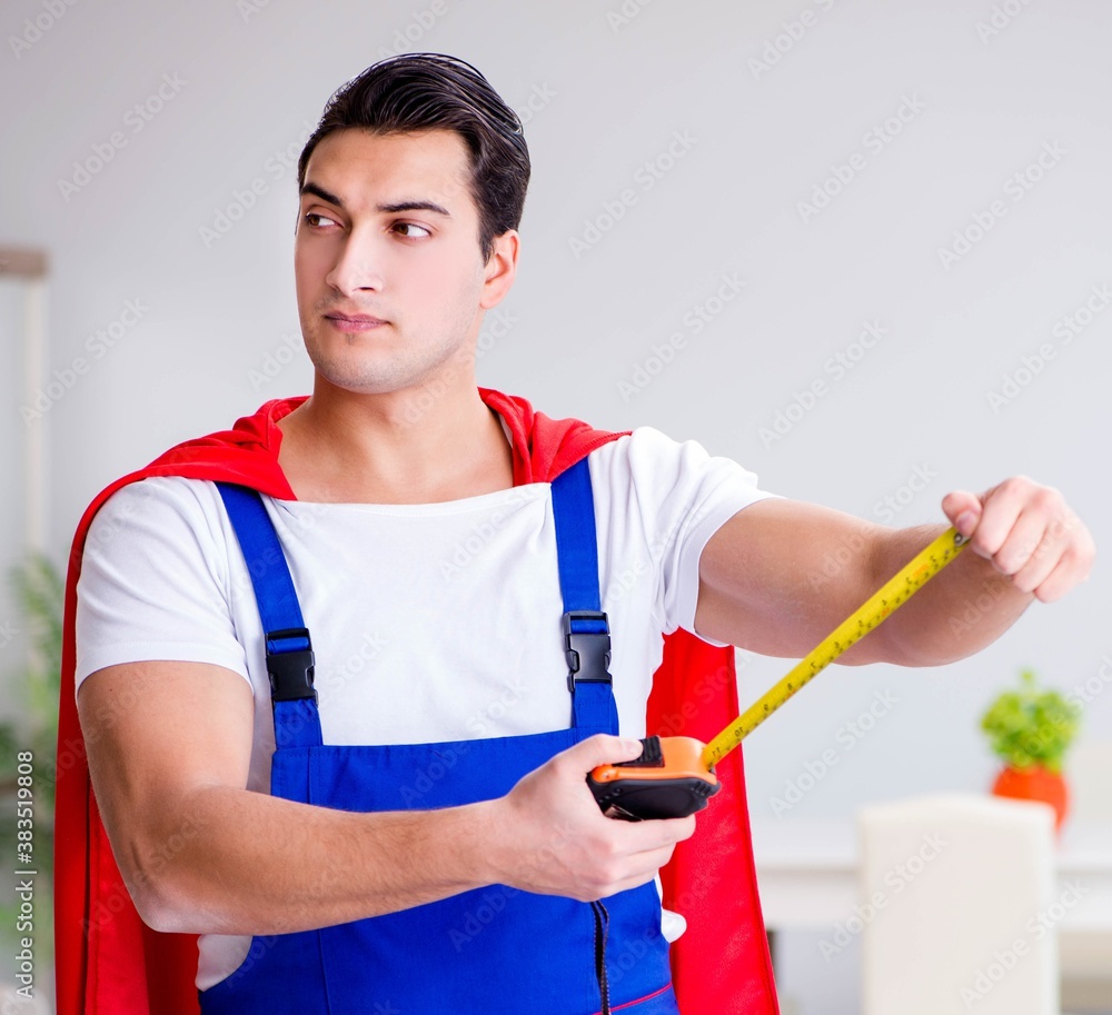 Superhero repairman with tools in repair concept Superhero repairman with tools in repair concept