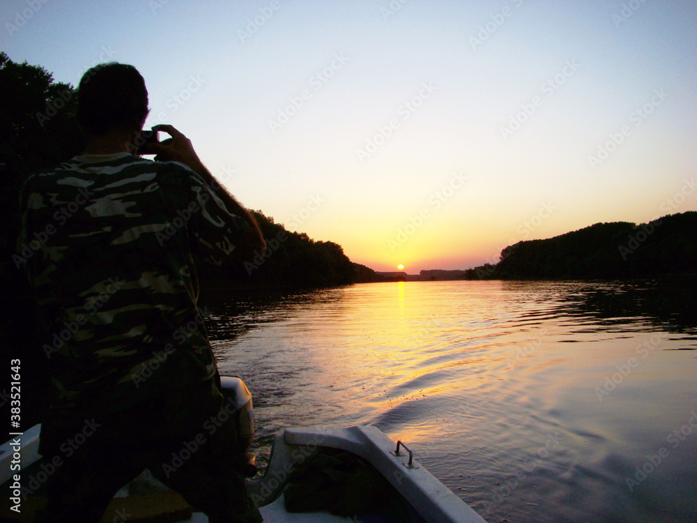 Fototapeta premium silhouette of a person on a sunset