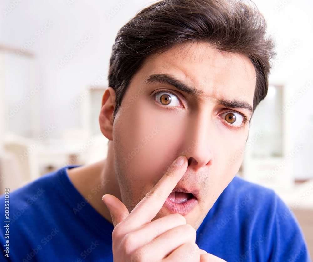 Man panicking because of pimples on the skin Man panicking because of pimples on the skin