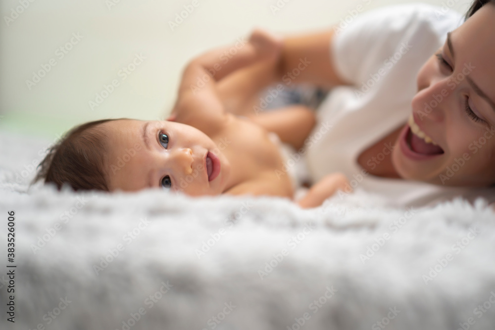 mother enjoying with her baby mother enjoying with her baby