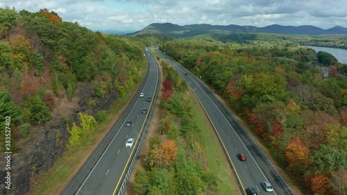 flying over middle of interstate 91 and tilting down in the early autumn photo