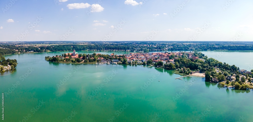 Idyllic  aerial view on Ratzenburger See. Lake with boats, sailboats, blue sky. Schleswig Holstein, Ratzenburg, Germany.