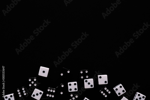 dice on a black background photo