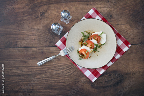 Caprese Salad on a Wooden T...