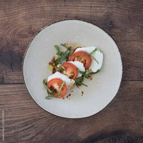 Caprese Salad on a Wooden T...