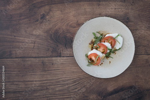 Caprese Salad on a Wooden T...