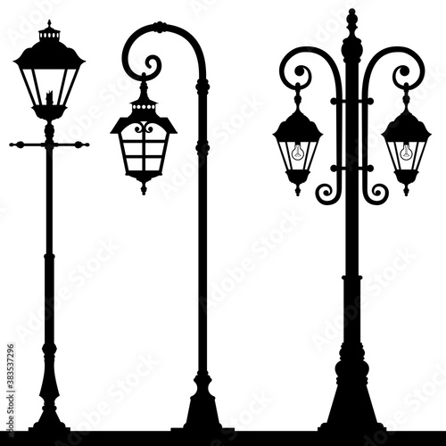 Set Of Lanterns Silhouettes.
Vintage street light. Black silhouettes of the retro lanterns on a white background. Vector illustration.