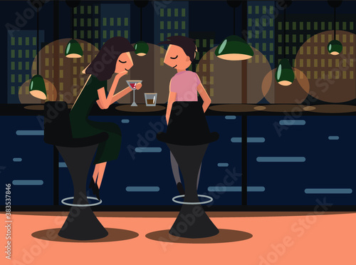 A guy and a girl on a date are chatting in the bar, enjoying a pleasant evening and drinking delicious drinks.