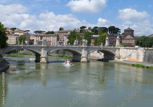 Wallpaper Mural a boat passes under a bridge on the Tiber river in Rome Torontodigital.ca