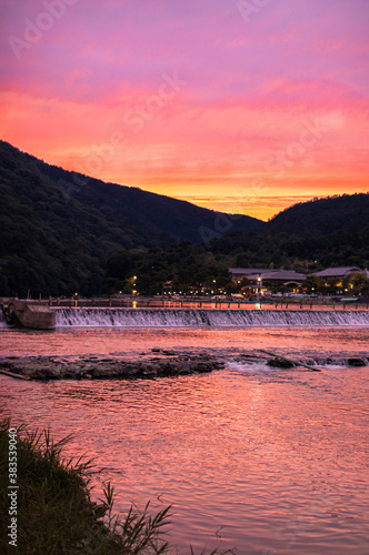 Sunset Hill with Evening Glow Reflection on the River