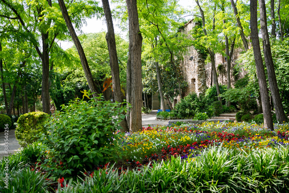 Park with flowers in the historical part of Girona, Spain Park with flowers in the historical part of Girona, Spain
