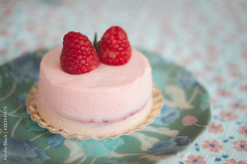 Blueberry mousse dessert on a dessert plate with fresh berries Blueberry mousse dessert on a dessert plate with fresh berries