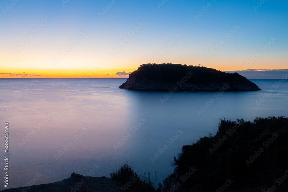 First rays of sun in the Portixol, a cool place near Jávea, in Alicante (Spain)