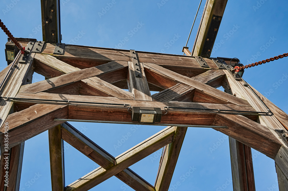 Detailed view of one of the oldest and still functional wooden bascule bridges in Greifswald, Germany. Detailed view of one of the oldest and still functional wooden bascule bridges in Greifswald, Germany.