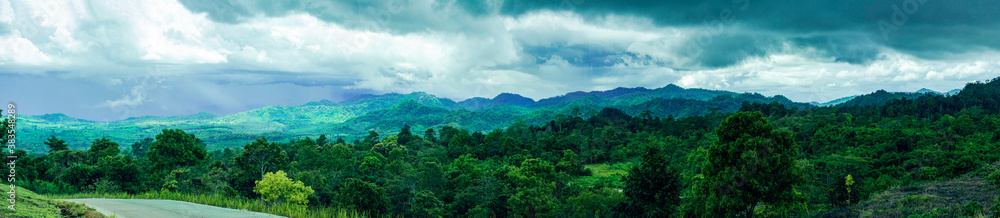 Panorama view of travelling on green mountain road with raining, Holiday activity, Beautiful landscape mountain in Thailand