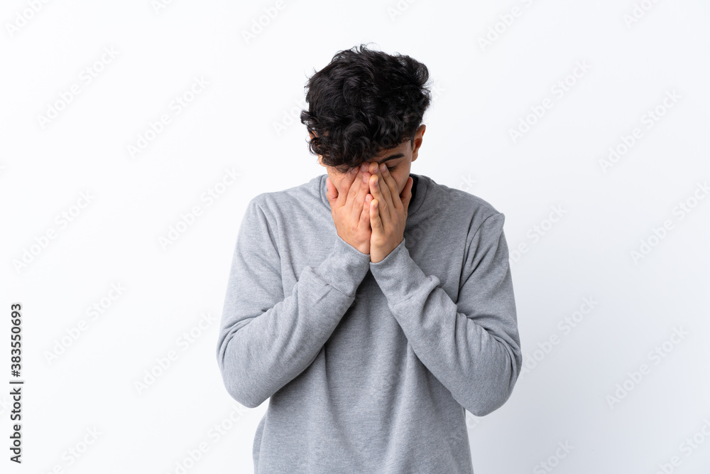 Young Argentinian man over isolated white background with tired and sick expression Young Argentinian man over isolated white background with tired and sick expression