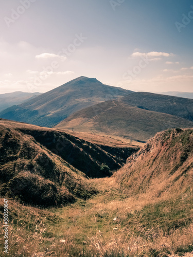 Alpine scenery in the Carpathian Mountains. Straja Peak in background. Romania, Europe.