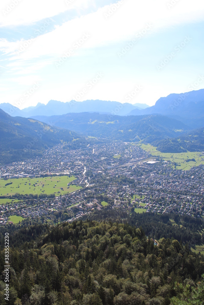 Aerial image of the city of Garmisch-Partenkirchen taken on Kramer Mountain in COVID-19 summer 2020