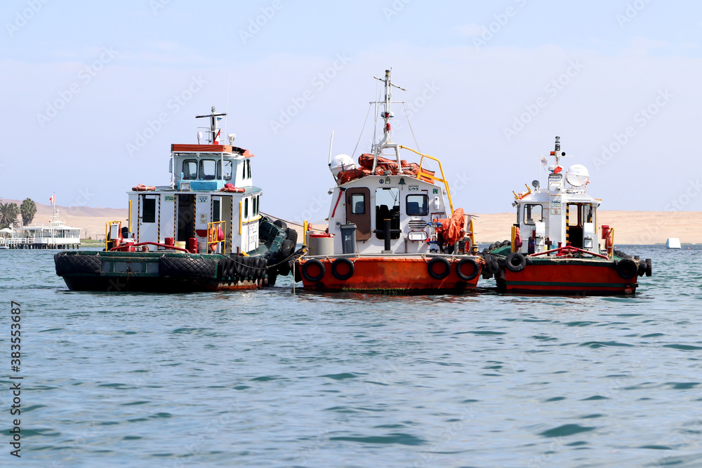 Peruvian fishing boats in the ocean Peruvian fishing boats in the ocean