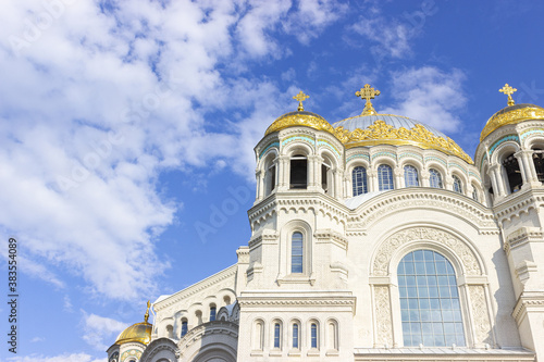 Kronshtadt, Saint Petersburg, Russia,09.08.2020. The Cathedral of St. Nicholas the Wonderworker. Blue sky, clouds and sunny weather. important religious site.