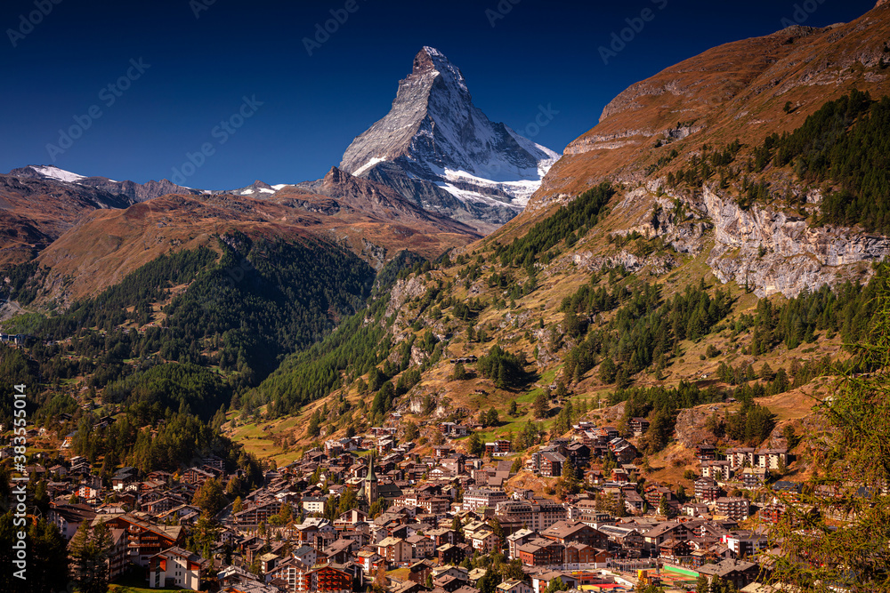 Zermatt, Switzerland. Image of iconic village of Zermatt, Switzerland with the Matterhorn in the background at beautiful sunny autumn day.