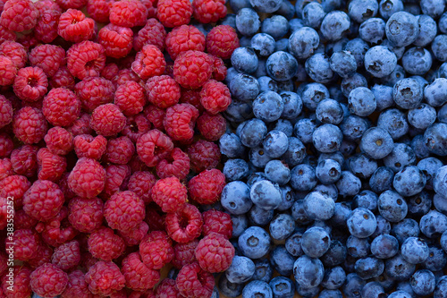 background of raspberries and blueberries
