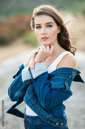 Beauty portrait of female face with natural skin. Beauty portrait of female face. Gorgeous young model woman posing in the city. Wonderful white female. Stylish. Hipster. Russian.