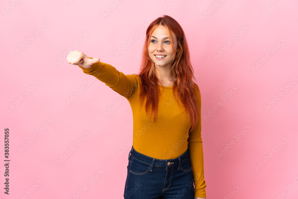 Teenager Russian girl isolated on pink background giving a thumbs up gesture Teenager Russian girl isolated on pink background giving a thumbs up gesture