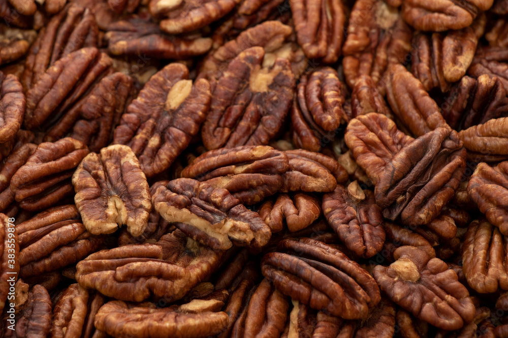 cleared pecan kernels close-up on the table cleared pecan kernels close-up on the table