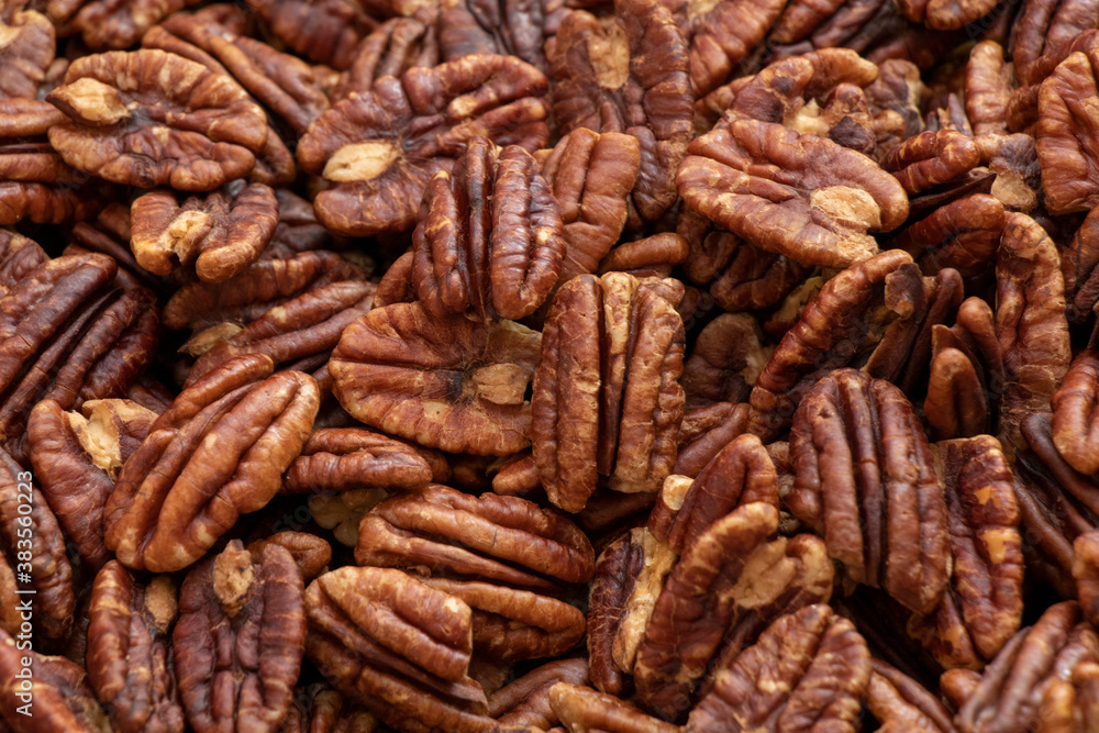 cleared pecan kernels close-up on the table cleared pecan kernels close-up on the table
