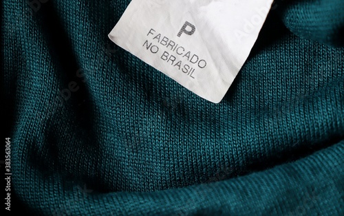 Fabricado no Brasil (Made in Brazil) clothing label. Brazilian product. P size (S size). 