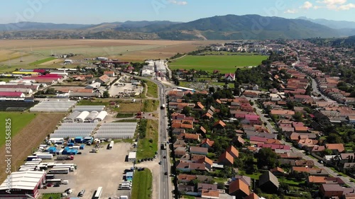 Flying along the ring road of Sacele on a sunny day photo