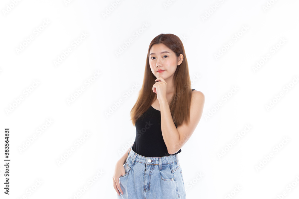 Fashion of a beautiful young asian woman in a pretty black vest and blue jeans feeling smile and happy. isolated on white background. Summer fashion beauty and style. Fashion of a beautiful young asian woman in a pretty black vest and blue jeans feeling smile and happy. isolated on white background. Summer fashion beauty and style.