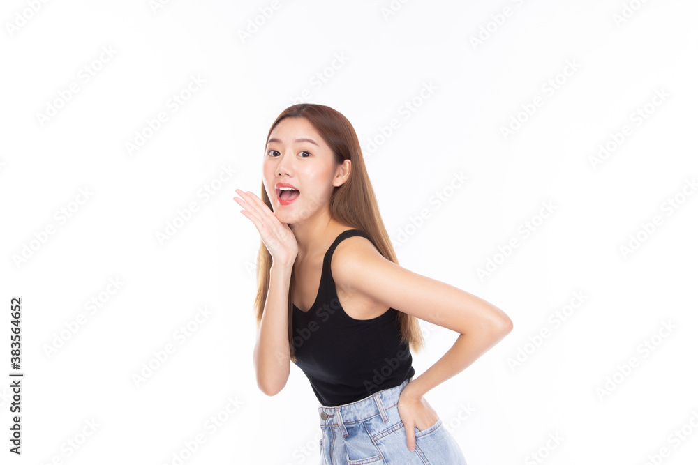 Fashion of a beautiful young asian woman in a pretty black vest and blue jeans feeling smile and happy. isolated on white background. Summer fashion beauty and style. Fashion of a beautiful young asian woman in a pretty black vest and blue jeans feeling smile and happy. isolated on white background. Summer fashion beauty and style.
