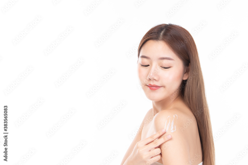 Beautiful happy woman applying cream face on shoulder. Closeup portrait healthy smiling female model with natural make up fresh soft pure skin applying moisturizing lotion. Beautiful happy woman applying cream face on shoulder. Closeup portrait healthy smiling female model with natural make up fresh soft pure skin applying moisturizing lotion.