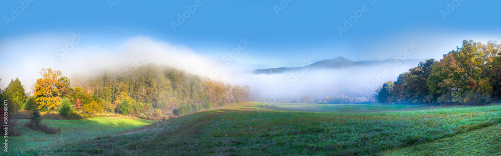 Scenic panorama in Cades Cove in Smokey mountains national park in autumn.