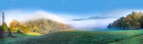Scenic panorama in Cades Cove in Smokey mountains national park in autumn.