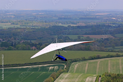 Fotografie Hang Glider flying at Combe Gibbet, England