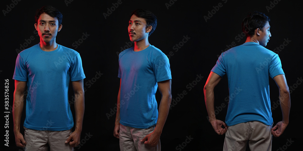 Obraz premium Young male in blank blue T-shirt, front and back view, isolated black background. Design men tshirt template and mockup for print