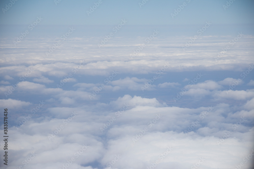 beautiful background flying above the clouds